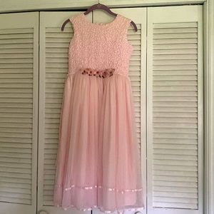 Selling a rose pink dress the brand is Perfectly Dressed the size is juniors 14